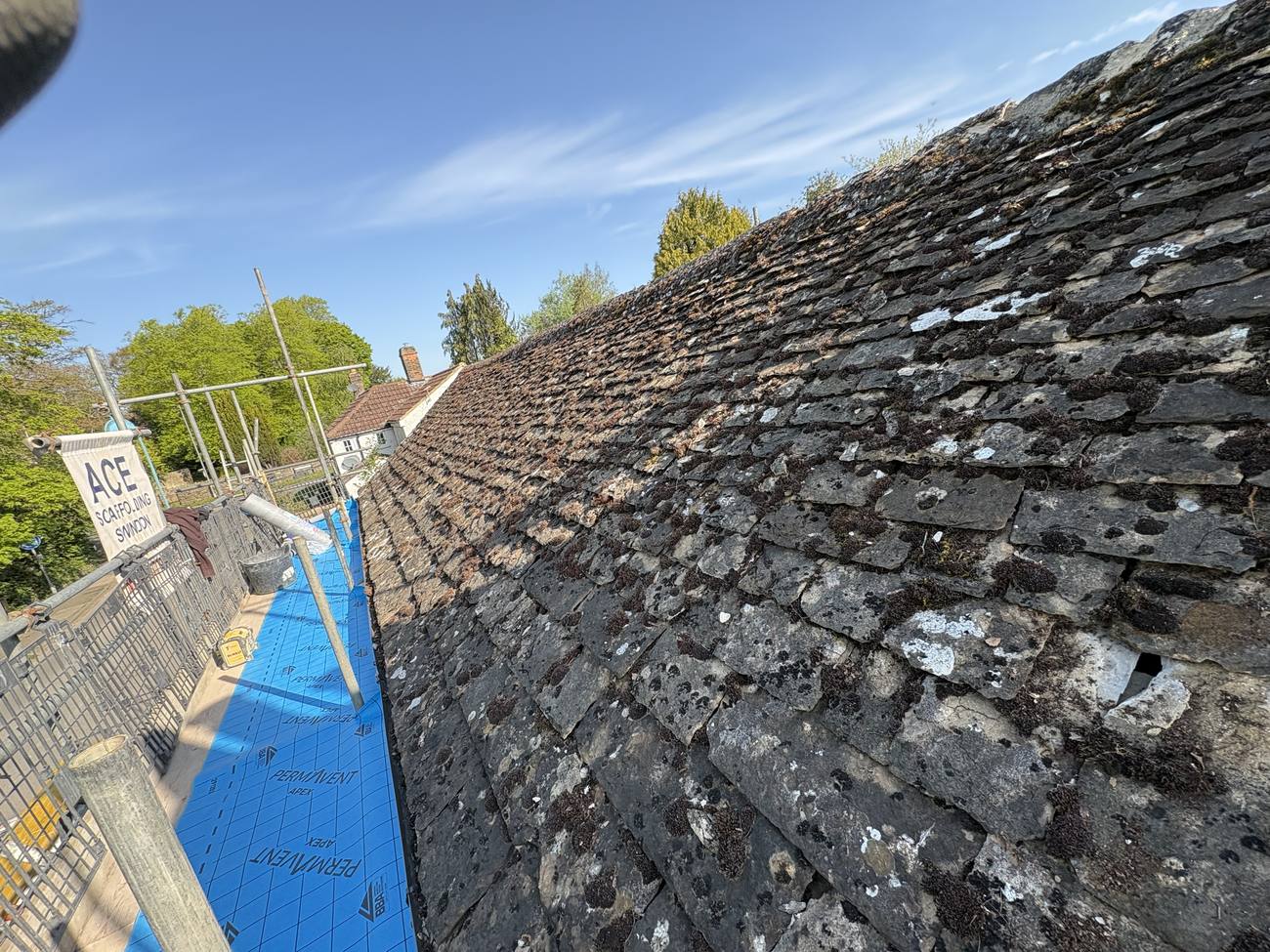 Aged, moss-covered roof before